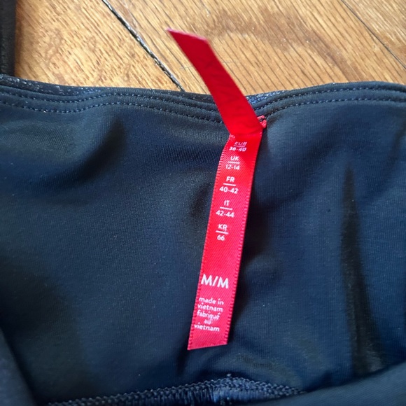 Black Faux Leather Leggings with White Stripe - Picture 4 of 4